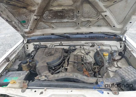 2002 Nissan Frontier Xe z USA, uszkodzony, nr VIN 1N6DD26S42C336520